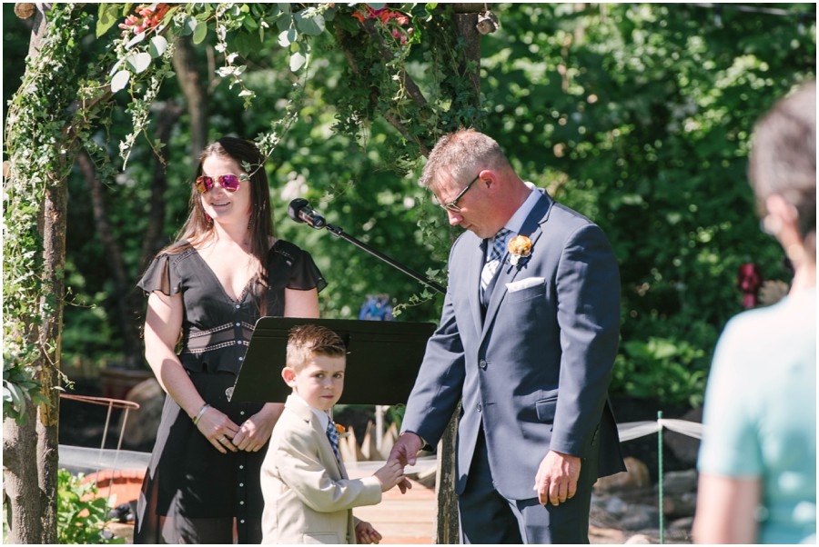 groom and ring bearer at backyard wedding in coatesville pa